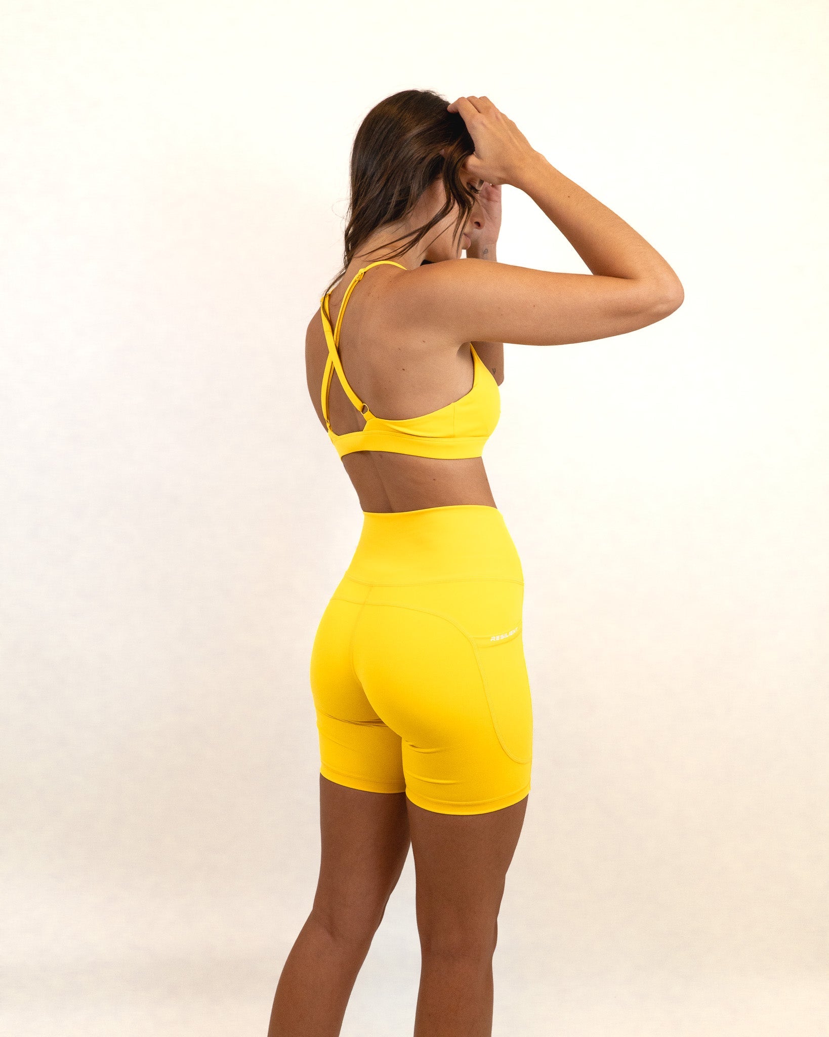 Define Biker Short with Pockets - Light Yellow - - Resilient Active